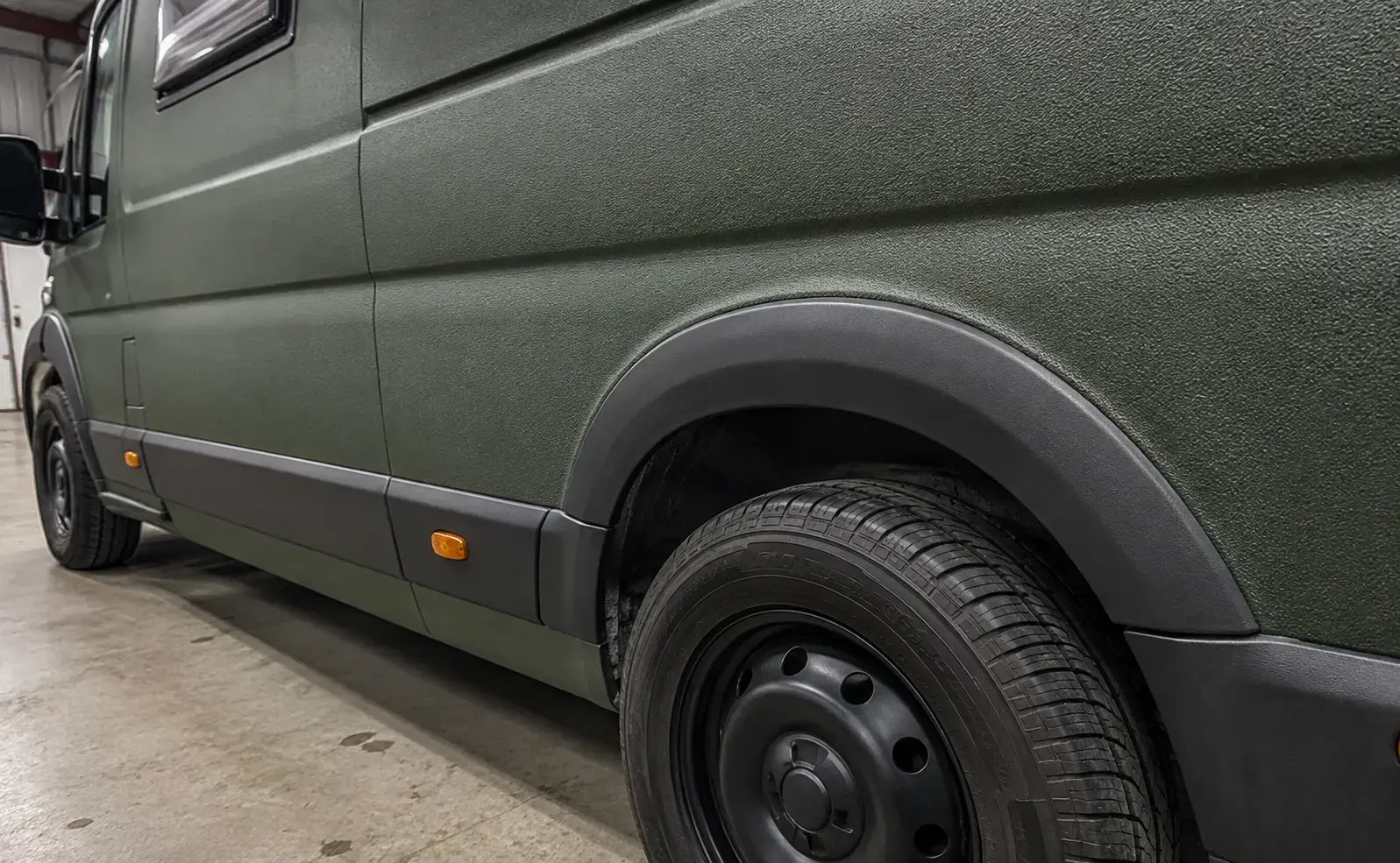 Close detail of a coloured textured Raptor finish